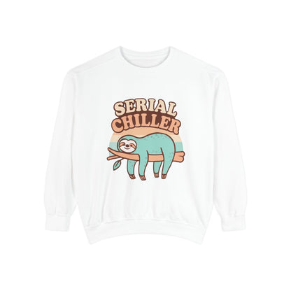 White sweatshirt with a sloth graphic and 'Serial Chiller' text on a white background