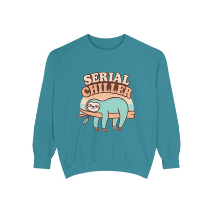 Teal sweatshirt with a sloth graphic and 'Serial Chiller' text on a white background