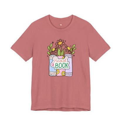 Whimsical Reading Tee, Cute Book Lover Shirt, Gift for Readers, Flower Graphic Tee, Summer Casual Wear, Literary Lover T-shirt