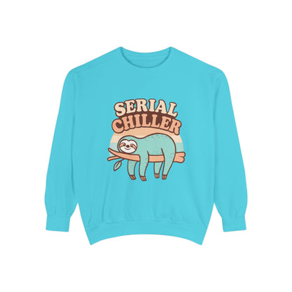 Turquoise sweatshirt with a sloth graphic and 'Serial Chiller' text on a white background