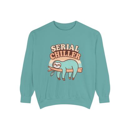 Teal sweatshirt with a sloth graphic and 'Serial Chiller' text on a white background
