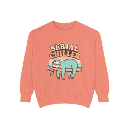 Coral sweatshirt with a sloth graphic and 'Serial Chiller' text on a white background