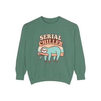 Green sweatshirt with a sloth graphic and 'Serial Chiller' text on a white background